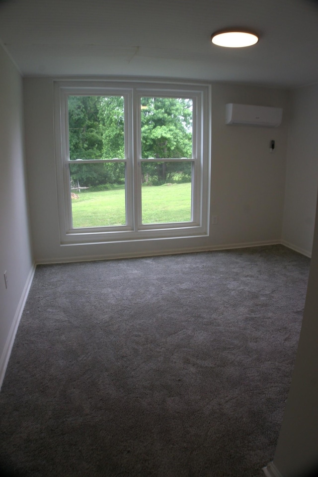 1202 Willow Brook Pass, Mount Juliet, TN 37122 - unfurnished room with a wall mounted air conditioner, carpet, and baseboards