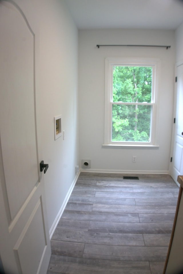 1202 Willow Brook Pass, Mount Juliet, TN 37122 - washroom featuring washer hookup, wood finished floors, hookup for an electric dryer, and baseboards