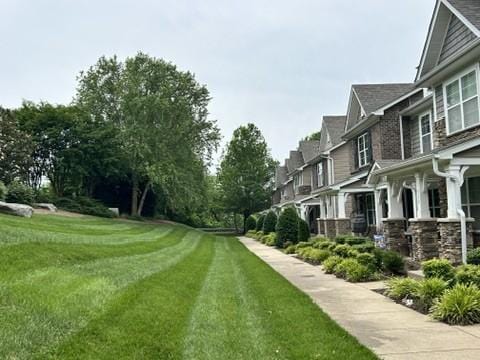 312 Mapleton Aly, Hermitage, TN 37076 - surrounding community with a lawn and a residential view