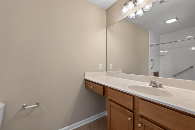 312 Mapleton Aly, Hermitage, TN 37076 - bathroom with toilet, vanity, a shower, and baseboards