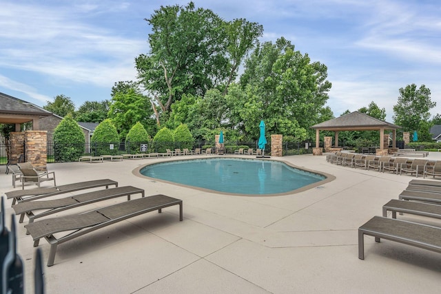 312 Mapleton Aly, Hermitage, TN 37076 - community pool featuring a gazebo, a patio, and view of wooded area