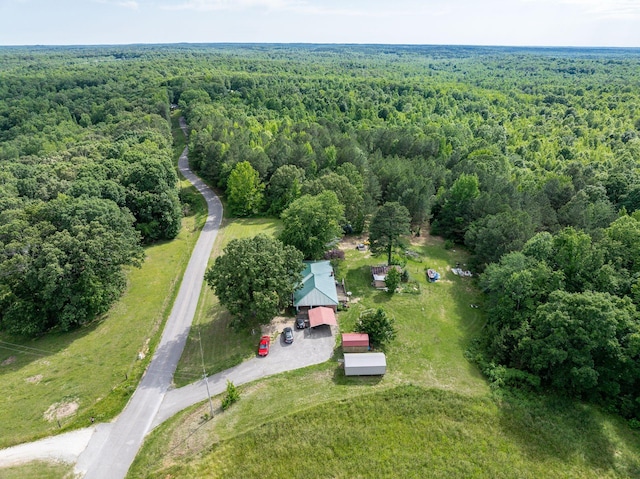 135 Old Union Church Rd, Holladay, TN 38341 - aerial view of property and surrounding area featuring a heavily wooded area