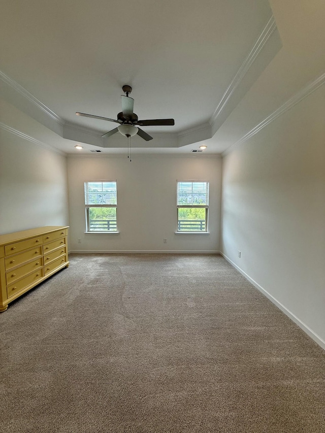 1020 Wiseman Farm Rd, Fairview, TN 37062 - carpeted empty room featuring a raised ceiling, ornamental molding, healthy amount of natural light, a ceiling fan, and recessed lighting