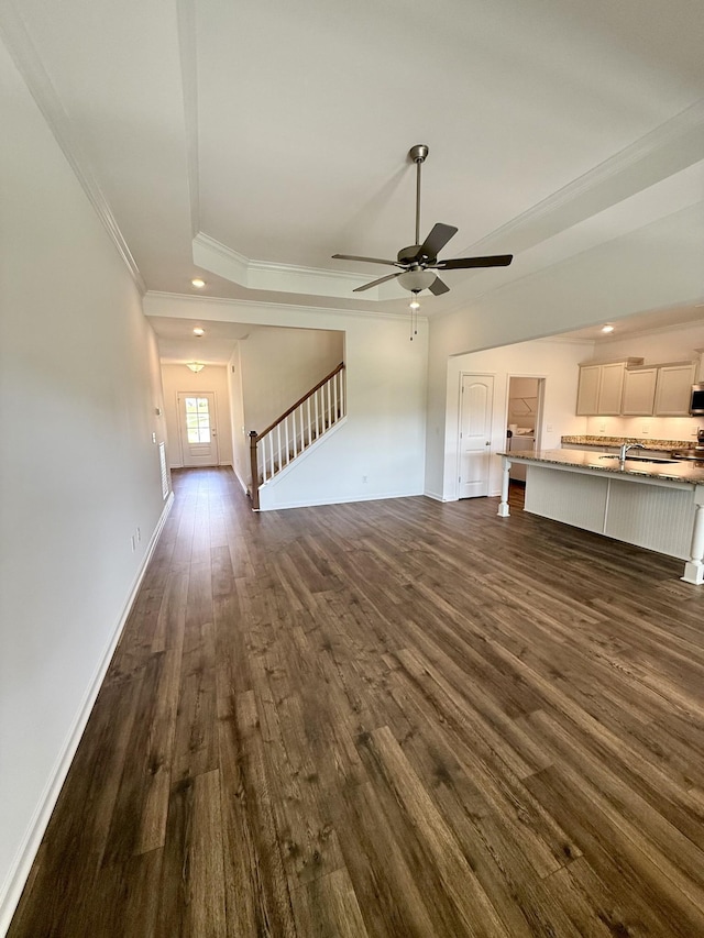 1020 Wiseman Farm Rd, Fairview, TN 37062 - unfurnished living room with crown molding, dark wood-style flooring, recessed lighting, stairway, and a ceiling fan