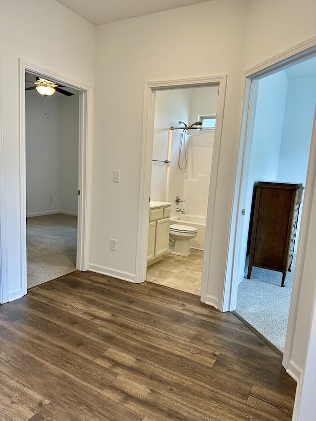 1020 Wiseman Farm Rd, Fairview, TN 37062 - corridor with wood finished floors and baseboards