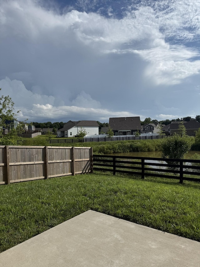 1020 Wiseman Farm Rd, Fairview, TN 37062 - fenced backyard with a patio and a residential view