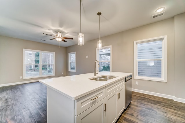 2471 Twill Pl, Chattanooga, TN 37404 - kitchen with stainless steel dishwasher, open floor plan, dark wood-style flooring, and decorative light fixtures