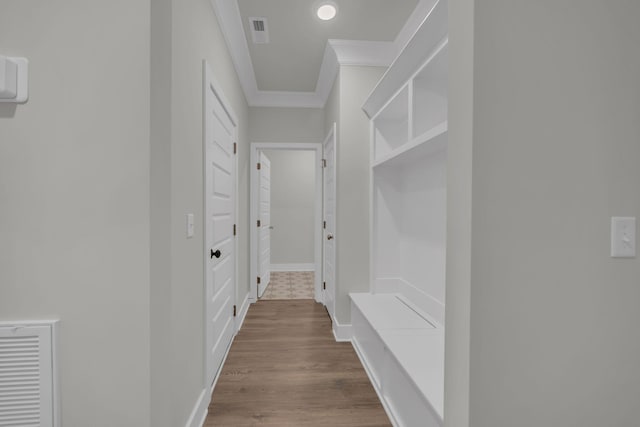 8545 Ari Ln, Chattanooga, TN 37421 - mudroom featuring crown molding, wood finished floors, and baseboards