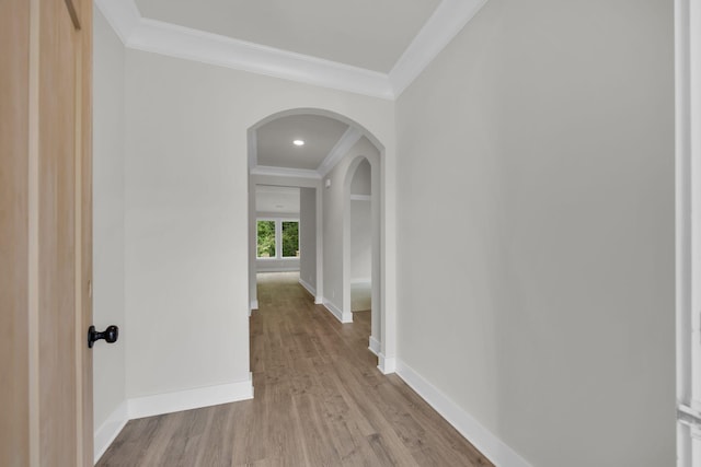 8545 Ari Ln, Chattanooga, TN 37421 - hall featuring crown molding, arched walkways, wood finished floors, and baseboards