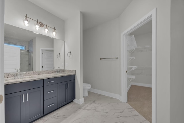 8545 Ari Ln, Chattanooga, TN 37421 - full bath with a shower stall, double vanity, a spacious closet, marble finish floors, and toilet
