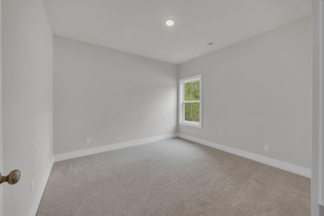 8545 Ari Ln, Chattanooga, TN 37421 - empty room featuring carpet, baseboards, and recessed lighting