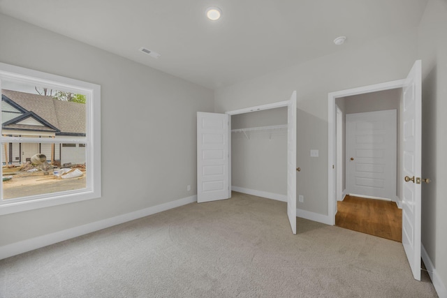 8545 Ari Ln, Chattanooga, TN 37421 - unfurnished bedroom featuring carpet, a closet, and baseboards