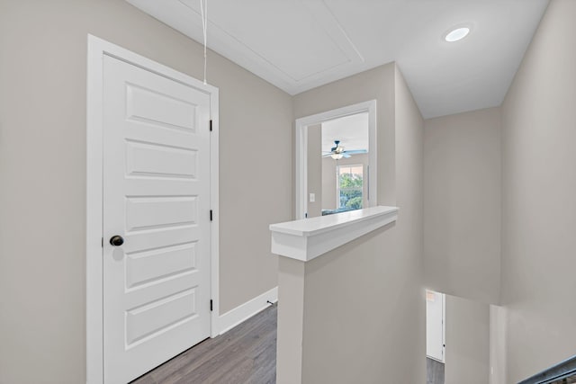 2413 E 17th St, Chattanooga, TN 37404 - hall with attic access, an upstairs landing, wood finished floors, and baseboards