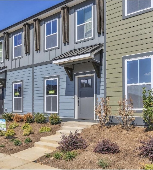 2413 E 17th St, Chattanooga, TN 37404 - view of front of house with board and batten siding
