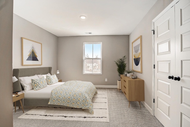 8529 Ari Ln, Chattanooga, TN 37421 - bedroom featuring light colored carpet, baseboards, and recessed lighting