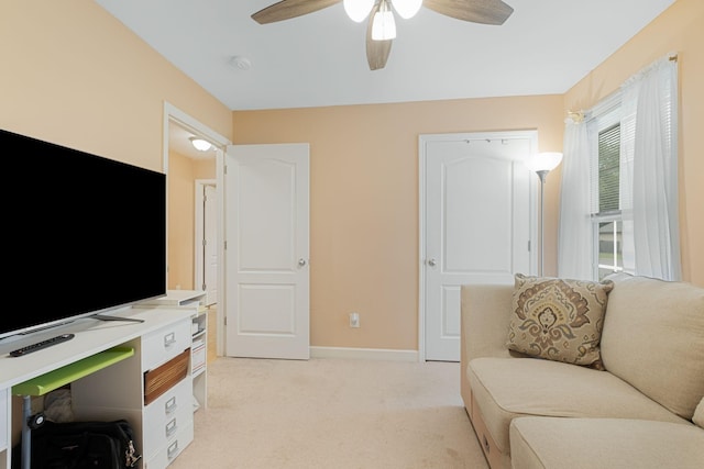 1305 Northlynn Dr, Lebanon, TN 37087 - living area featuring light carpet, ceiling fan, and baseboards