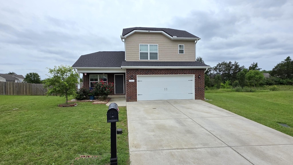 1217 Merritt Hill Trl, Smyrna, TN 37167 - view of front of property with driveway, a garage, and brick siding