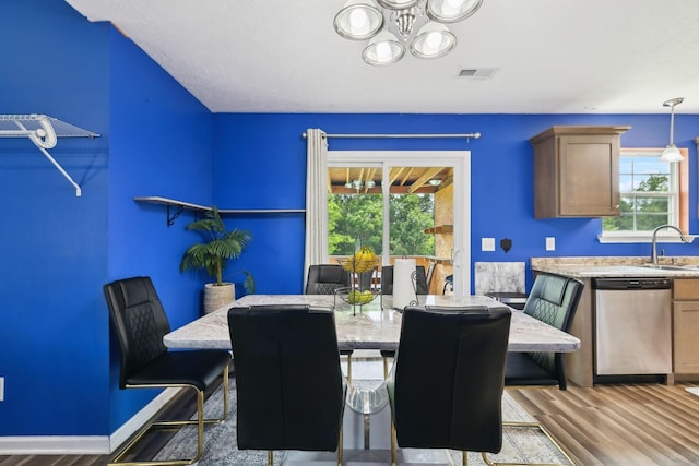 1217 Merritt Hill Trl, Smyrna, TN 37167 - dining room featuring wood finished floors and a chandelier