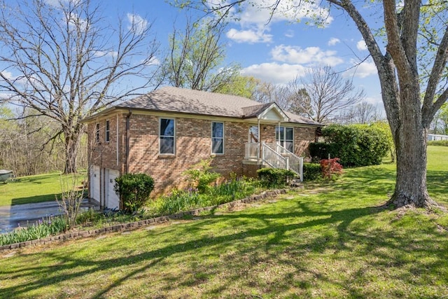 1190 Corum Hill Rd, Castalian Springs, TN 37031 - view of front facade with an attached garage, brick siding, and a front yard