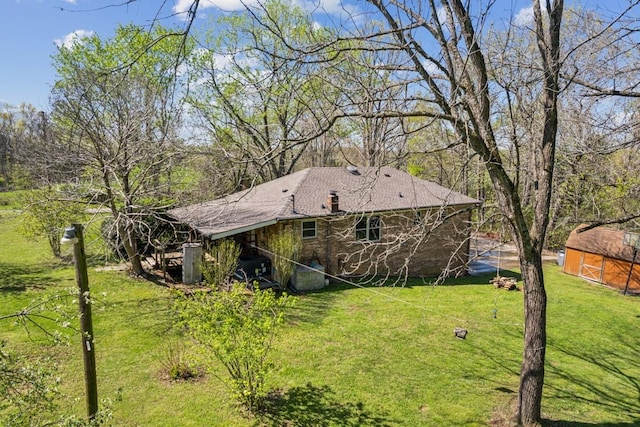 1190 Corum Hill Rd, Castalian Springs, TN 37031 - back of house featuring a lawn and a shingled roof
