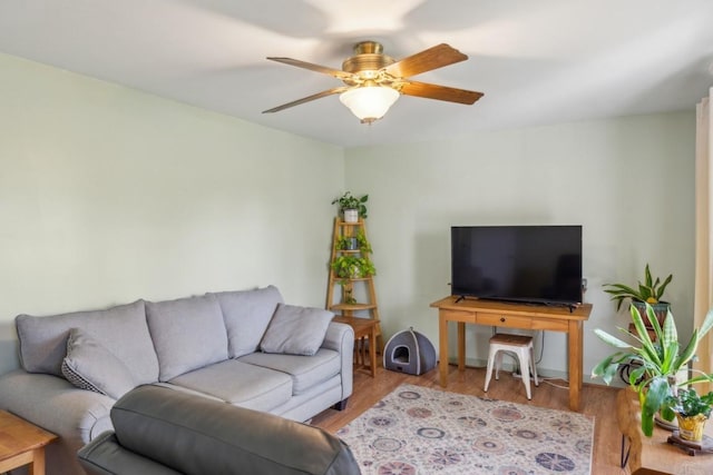 1190 Corum Hill Rd, Castalian Springs, TN 37031 - living area featuring a ceiling fan and wood finished floors