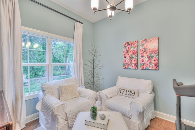 3433 Cortona Way, Murfreesboro, TN 37129 - sitting room with a chandelier, baseboards, and wood finished floors