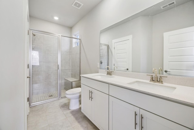 380 Gingerwood Ln, Hendersonville, TN 37075 - bathroom with toilet, a stall shower, double vanity, tile patterned flooring, and recessed lighting