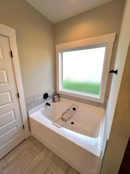 204 Julia Ann Ct, Springfield, TN 37172 - full bathroom with a garden tub and wood finished floors