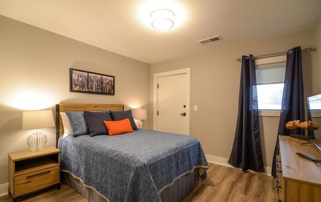 2507 Clifton Ave Unit 104, Nashville, TN 37209 - bedroom featuring wood finished floors and baseboards