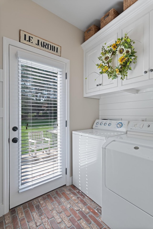 4075 Clovercroft Rd, Franklin, TN 37067 - washroom featuring cabinet space, separate washer and dryer, and brick floors