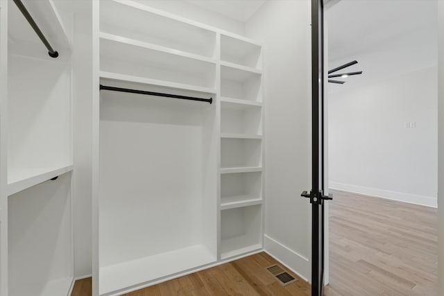 329 Lawndale Dr, Nashville, TN 37217 - walk in closet with wood finished floors
