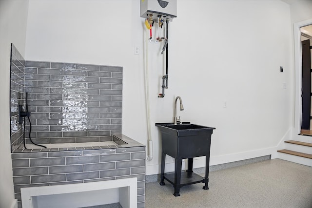 329 Lawndale Dr, Nashville, TN 37217 - bathroom featuring speckle patterned floor, baseboards, and water heater