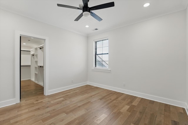 329 Lawndale Dr, Nashville, TN 37217 - unfurnished bedroom with light wood-style floors, baseboards, a spacious closet, recessed lighting, and a ceiling fan