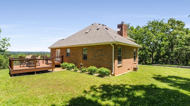 1056 Gilmore Hill Rd, Lebanon, TN 37087 - back of property with brick siding, a wooden deck, a chimney, a yard, and a shingled roof