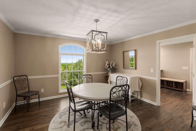 1056 Gilmore Hill Rd, Lebanon, TN 37087 - dining area featuring dark wood-type flooring, a chandelier, ornamental molding, a textured ceiling, and baseboards