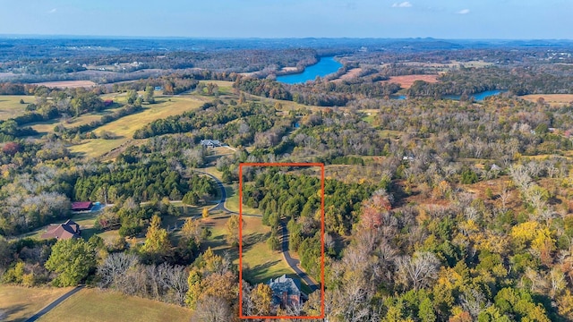 1056 Gilmore Hill Rd, Lebanon, TN 37087 - aerial view of property's location featuring property parcel outlined, a forest, and a large body of water