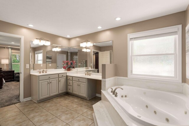1056 Gilmore Hill Rd, Lebanon, TN 37087 - bathroom with double vanity, a whirlpool tub, tile patterned flooring, and recessed lighting