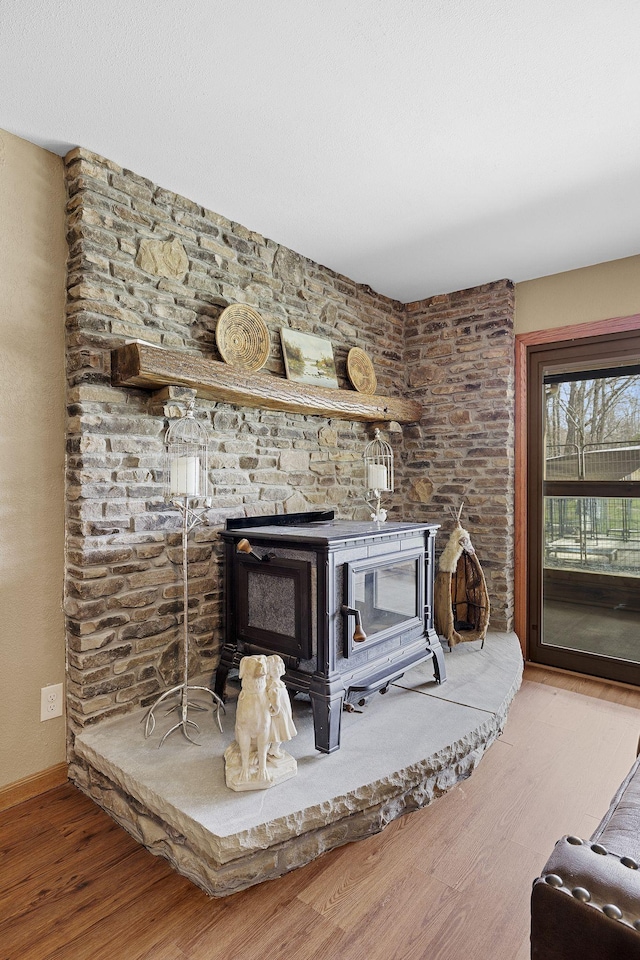 10669 S Windrow Rd, Rockvale, TN 37153 - detailed view of a wood stove and wood finished floors