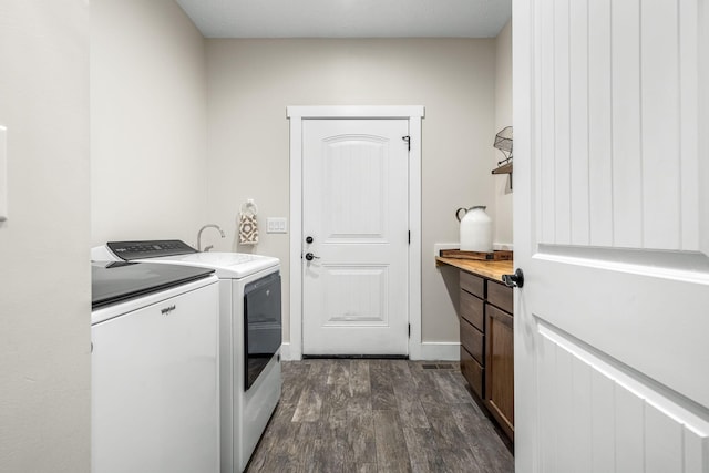 11 Walnut Creek Dr, Manchester, TN 37355 - washroom featuring washing machine and clothes dryer, dark wood-style floors, and baseboards
