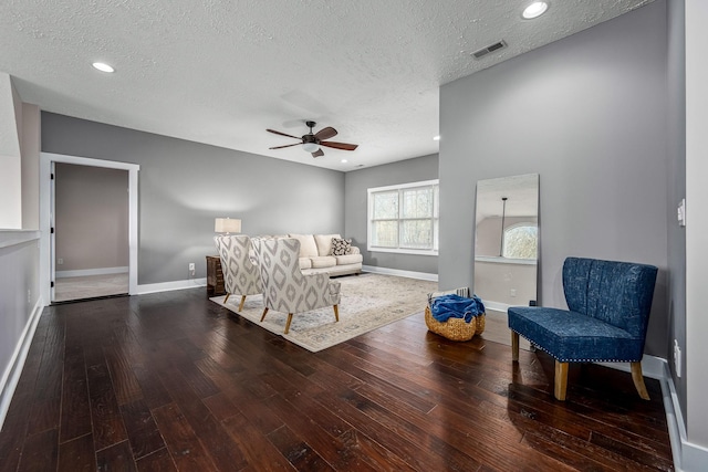11 Walnut Creek Dr, Manchester, TN 37355 - living room with wood-type flooring, a textured ceiling, ceiling fan, and baseboards