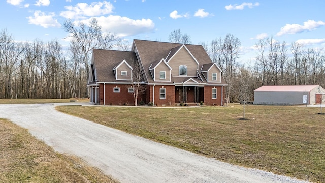 11 Walnut Creek Dr, Manchester, TN 37355 - traditional-style house featuring brick siding, driveway, a front yard, and covered porch
