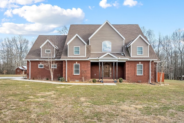 11 Walnut Creek Dr, Manchester, TN 37355 - view of front facade with brick siding, a front yard, and a shingled roof