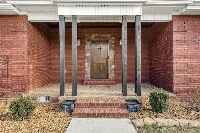 11 Walnut Creek Dr, Manchester, TN 37355 - doorway to property with brick siding and a porch