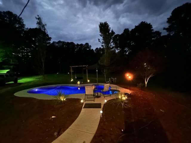 5935 Old Stage Rd, Huntingdon, TN 38344 - outdoor pool with a patio area and a yard