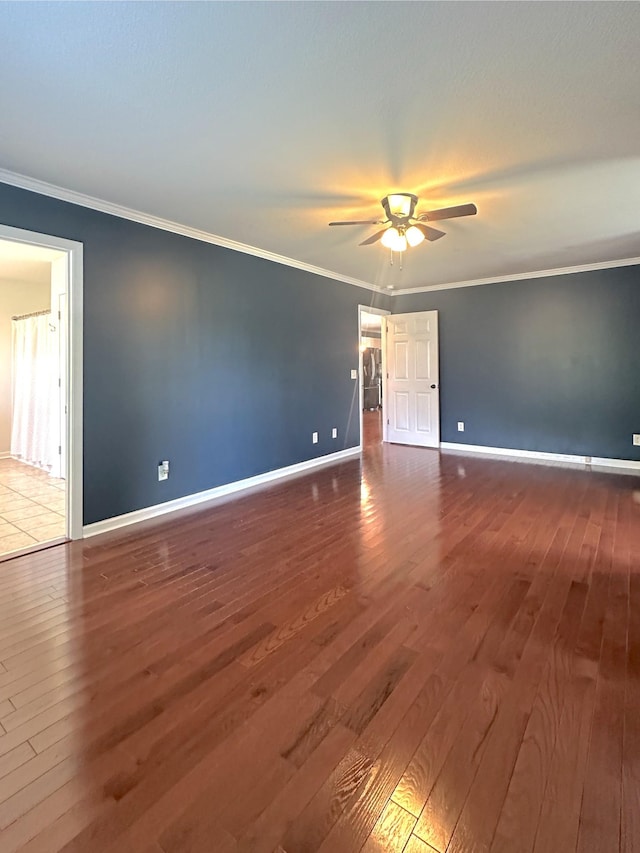 730 Everville Dr, Livingston, TN 38570 - spare room with hardwood / wood-style floors, ceiling fan, baseboards, and ornamental molding