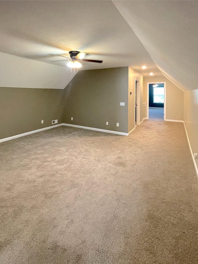 730 Everville Dr, Livingston, TN 38570 - additional living space with lofted ceiling, ceiling fan, baseboards, and carpet