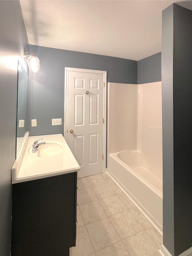 730 Everville Dr, Livingston, TN 38570 - bathroom featuring vanity, tile patterned floors, and tub / shower combination