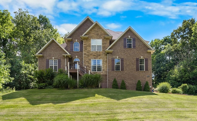 1721 Old Clarksville Pike, Chapmansboro, TN 37035 - view of front of property featuring a front lawn and brick siding