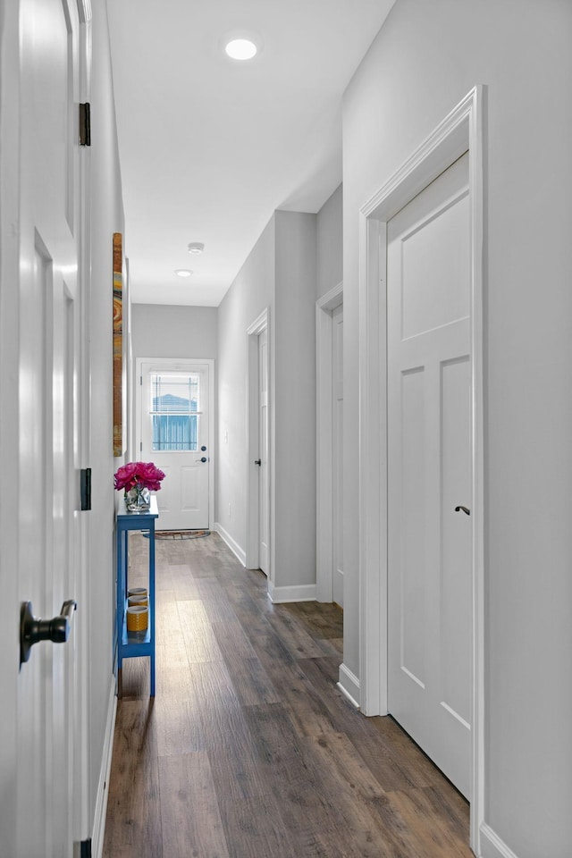 516 Main St, Burns, TN 37029 - hallway featuring dark wood finished floors and baseboards