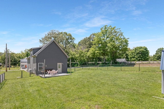 516 Main St, Burns, TN 37029 - view of yard featuring a patio area and view of wooded area
